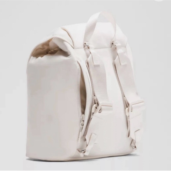 drawstring backpack lululemon Center-Zip Hiking  The zippered front pouch adds extra storage and can be detached to wear solojust add the optional strapfor when you want to travel light. Lululemon black cinch bag lululemon